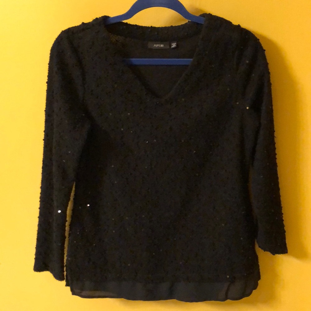 Comfy sweater w/sequin accent & bottom trim